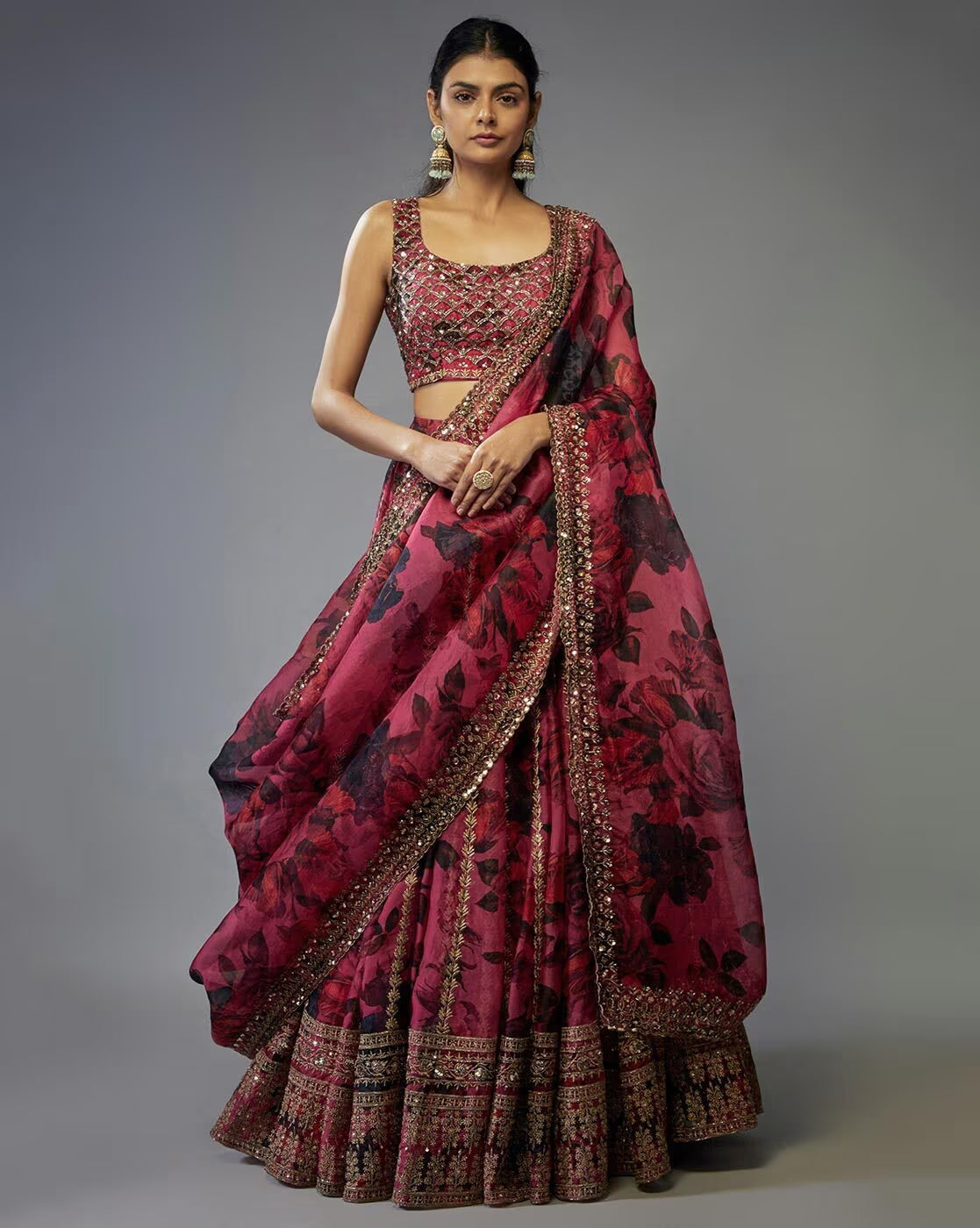 Model wearing AROMIE embroidered lehenga choli set Canada maroon floral lehenga with sleeveless blouse and embellished dupatta