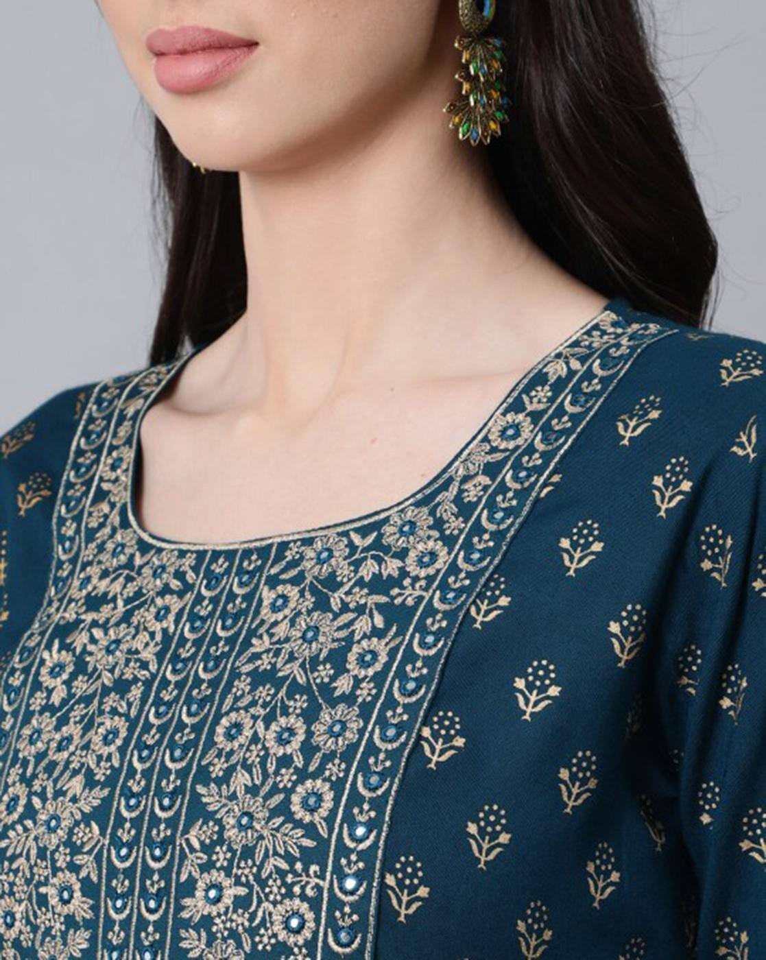 Aromie three piece Kurtha in teal with intricate gold floral embroidery on neckline Chinnon Anarkali Kurta Set Canada close up