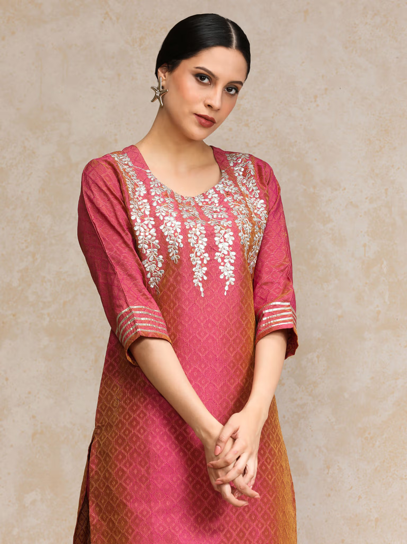 Aromie single piece kurta with intricate silver embroidery in pink and orange tones