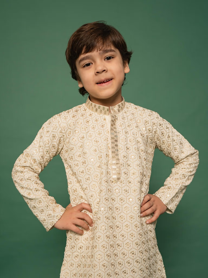 Boy modeling embroidered off white kurta with mandarin collar for celebration boys off white kurta pyjama set Canada