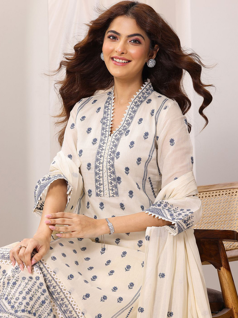 Elegant three piece embroidered cotton kurta Canada in cream with intricate blue designs and stylish sleeves