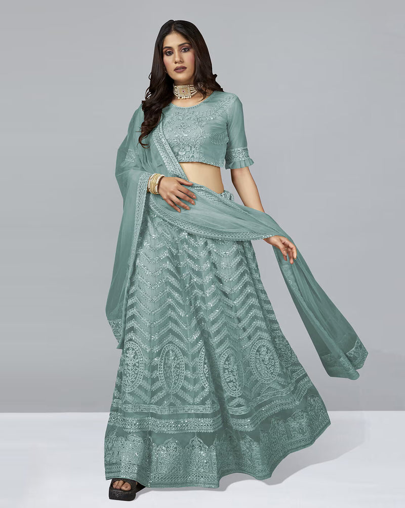 AROMIE Embellished A-Line Lehenga Choli Set in mint green with intricate embroidery and dupatta
