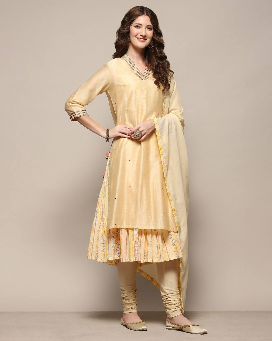 Aromie three piece floral embroidered silk kurta in pastel yellow with matching churidar and dupatta
