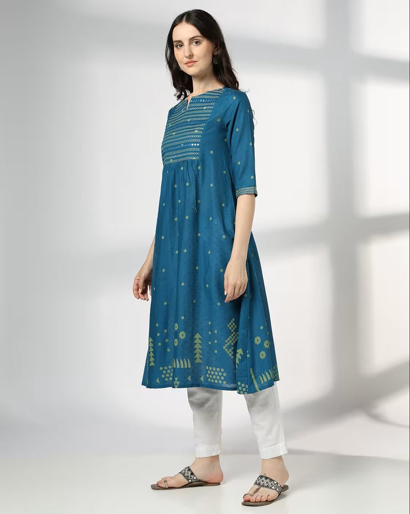 Aromie hand block printed jumpsuit in blue with half sleeves and geometric patterns paired with white pants