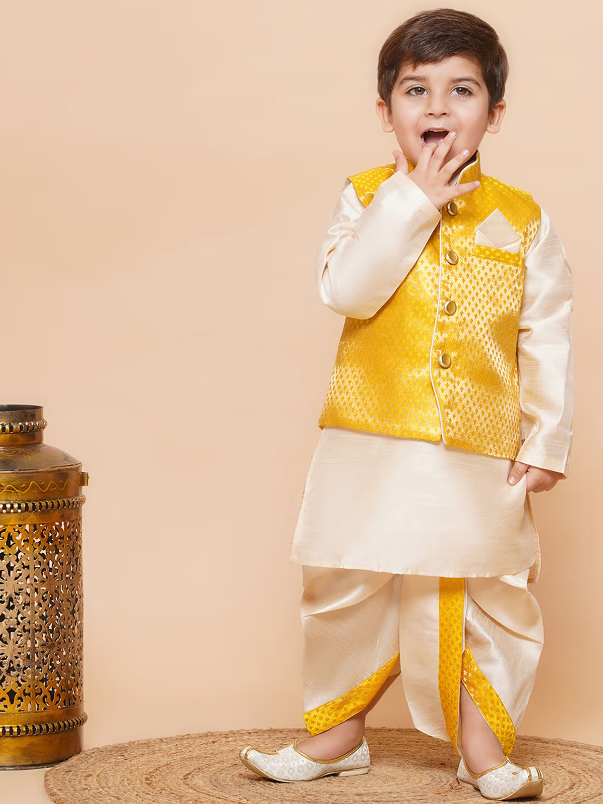 boys yellow dhoti kurta set with waistcoat young boy in cream kurta and dhoti with yellow waistcoat smiling and posing