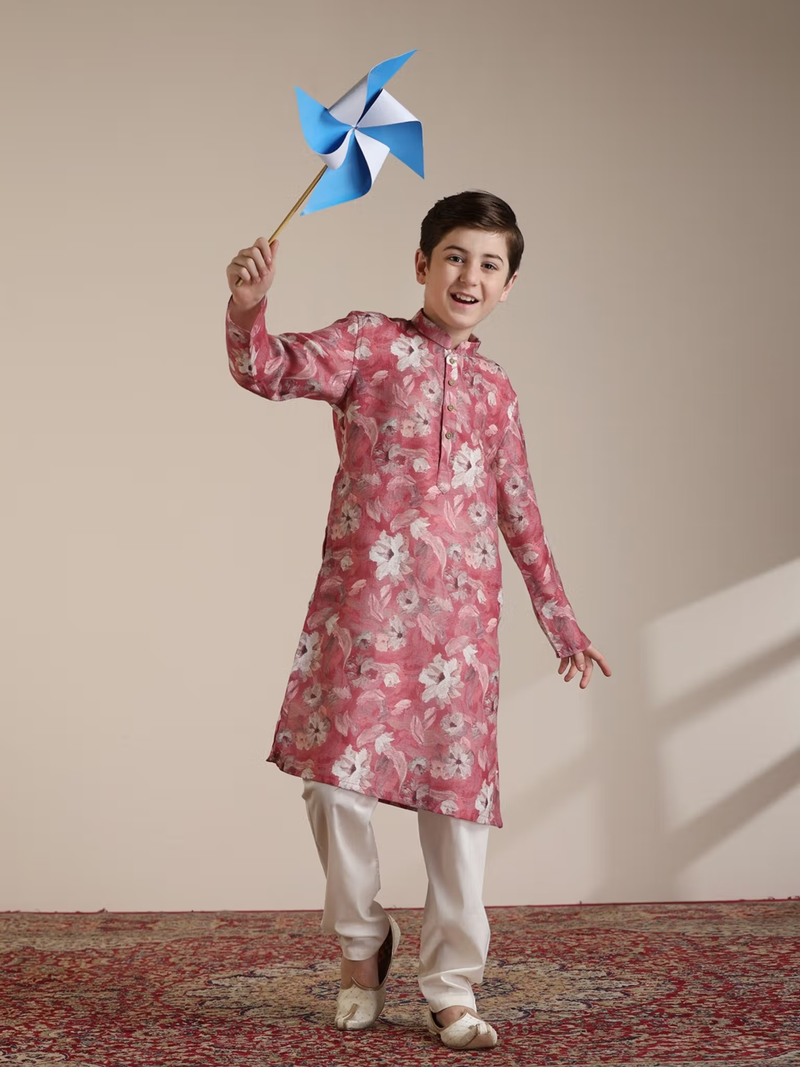 Happy boy modeling AROMIE boys pink kurta pyjama set Canada floral cotton kurta with white pyjama and pinwheel