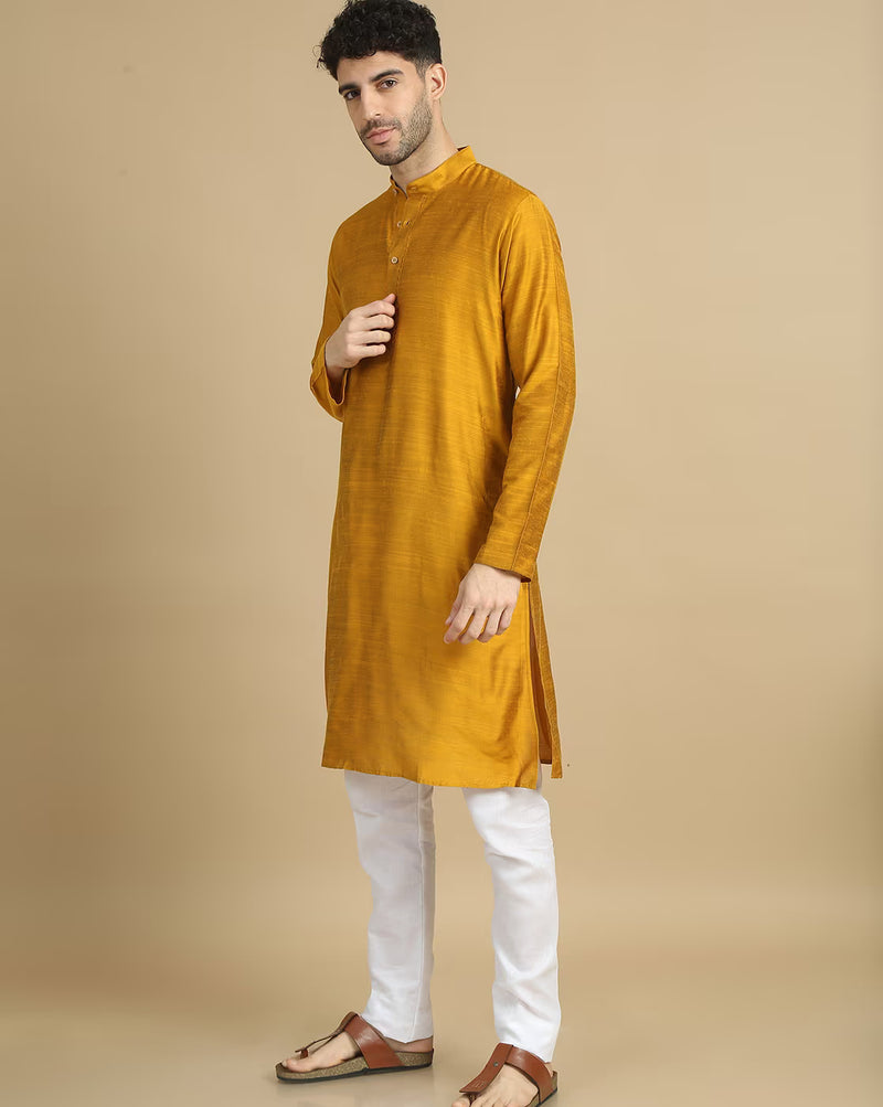 Stylish men's cotton kurta pyjama set in mustard with white pajama, perfect for festive occasions
