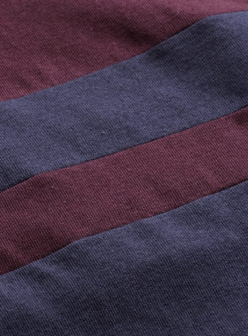 Close-up texture of aromie Navy Blue Maroon Cotton T-shirt fabric showing soft cotton material