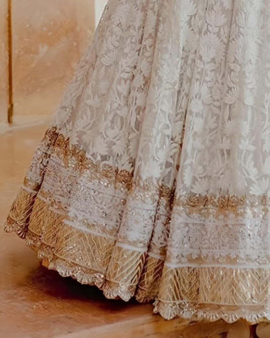 women embellished lehenga choli set ivory skirt with gold floral embroidery and tasseled hem for bridal wear