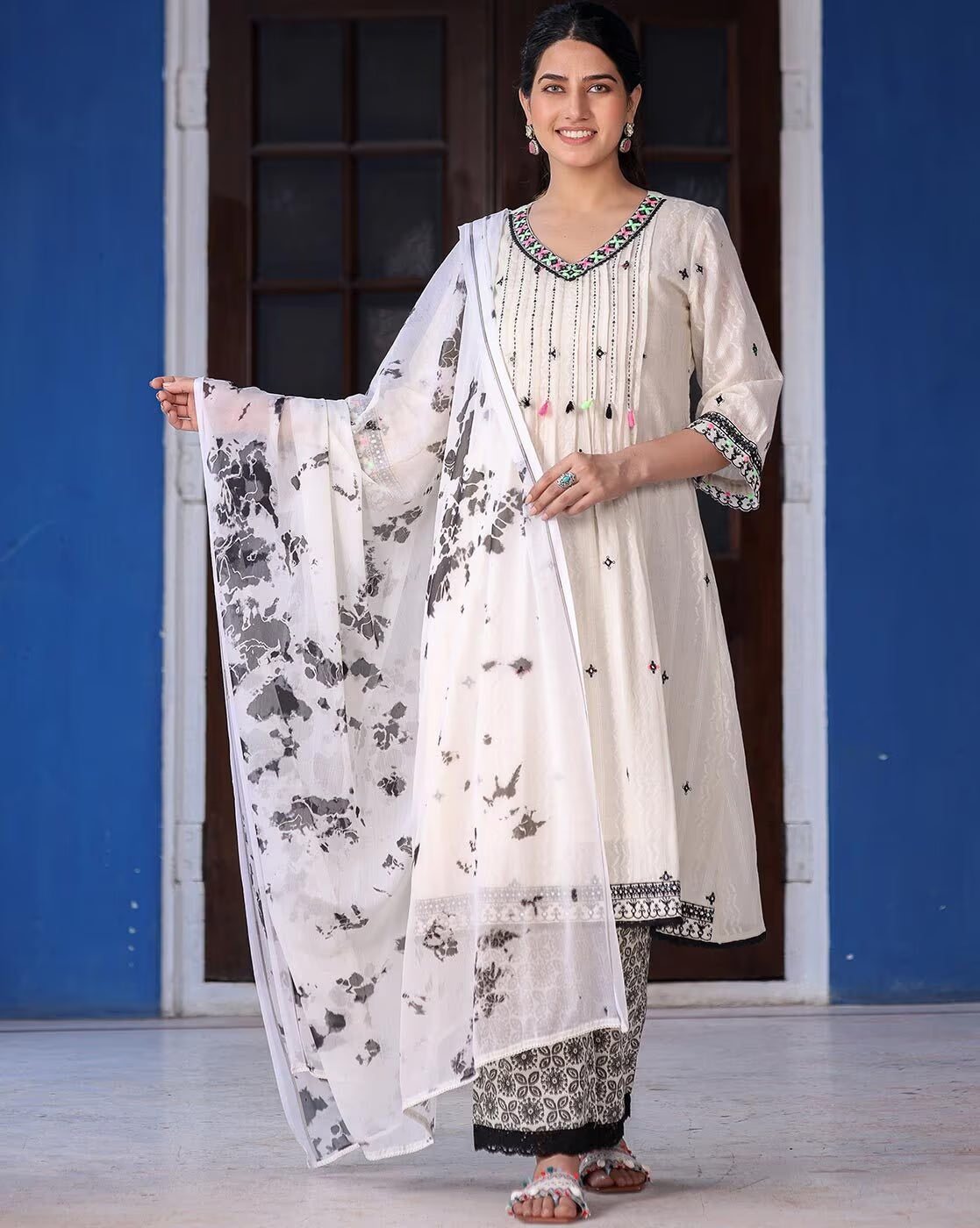 Aromie sea green ethnic kurta set featuring intricate embroidery and a flowy dupatta