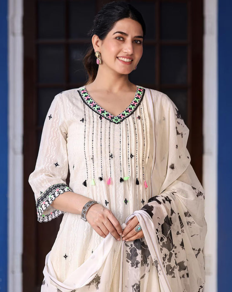 Elegant sea green ethnic kurta set with intricate embroidery and tassel details