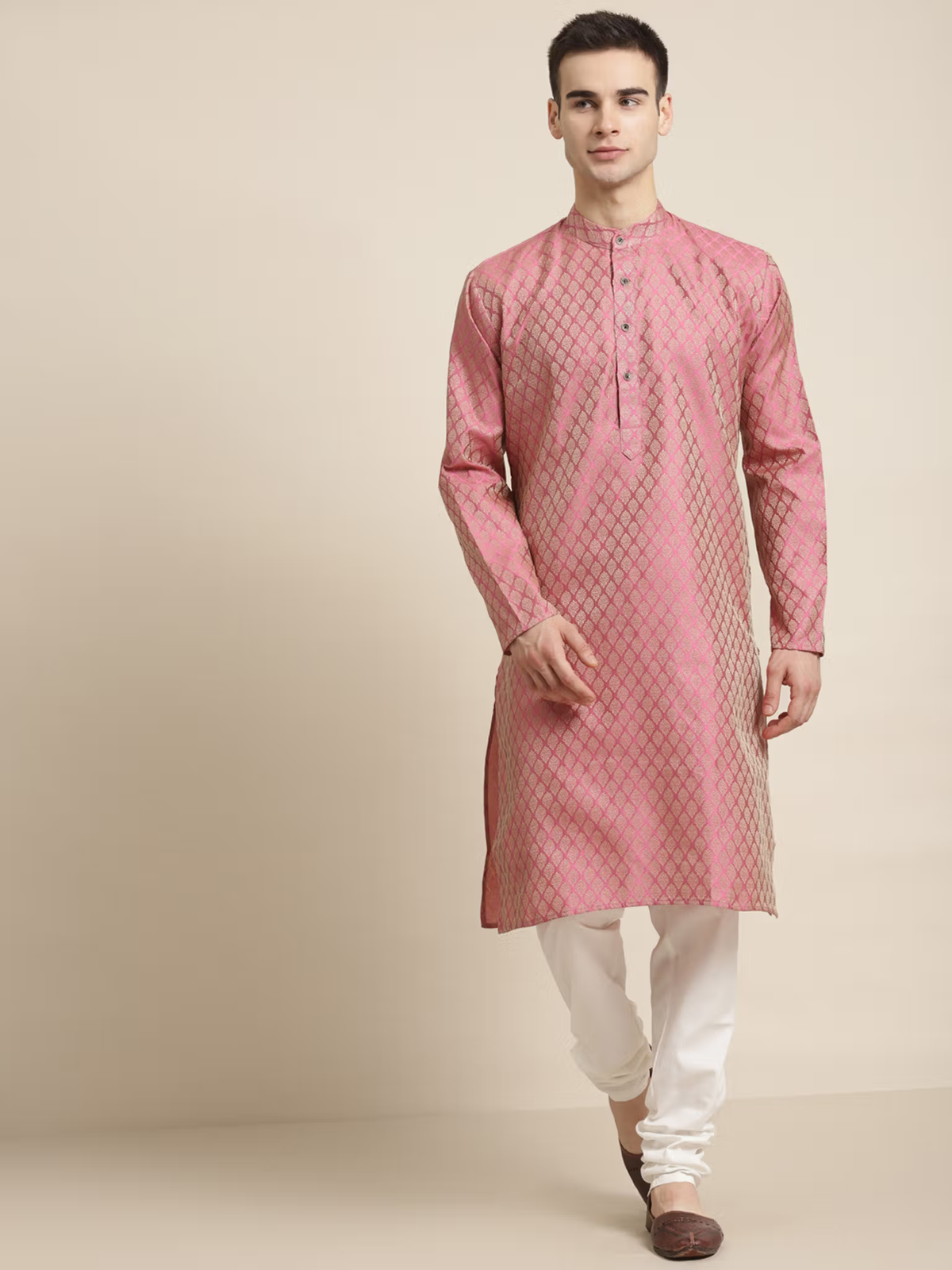 mens pink silk kurta set Canada model wearing patterned pink silk kurta with mandarin collar and white churidar pants
