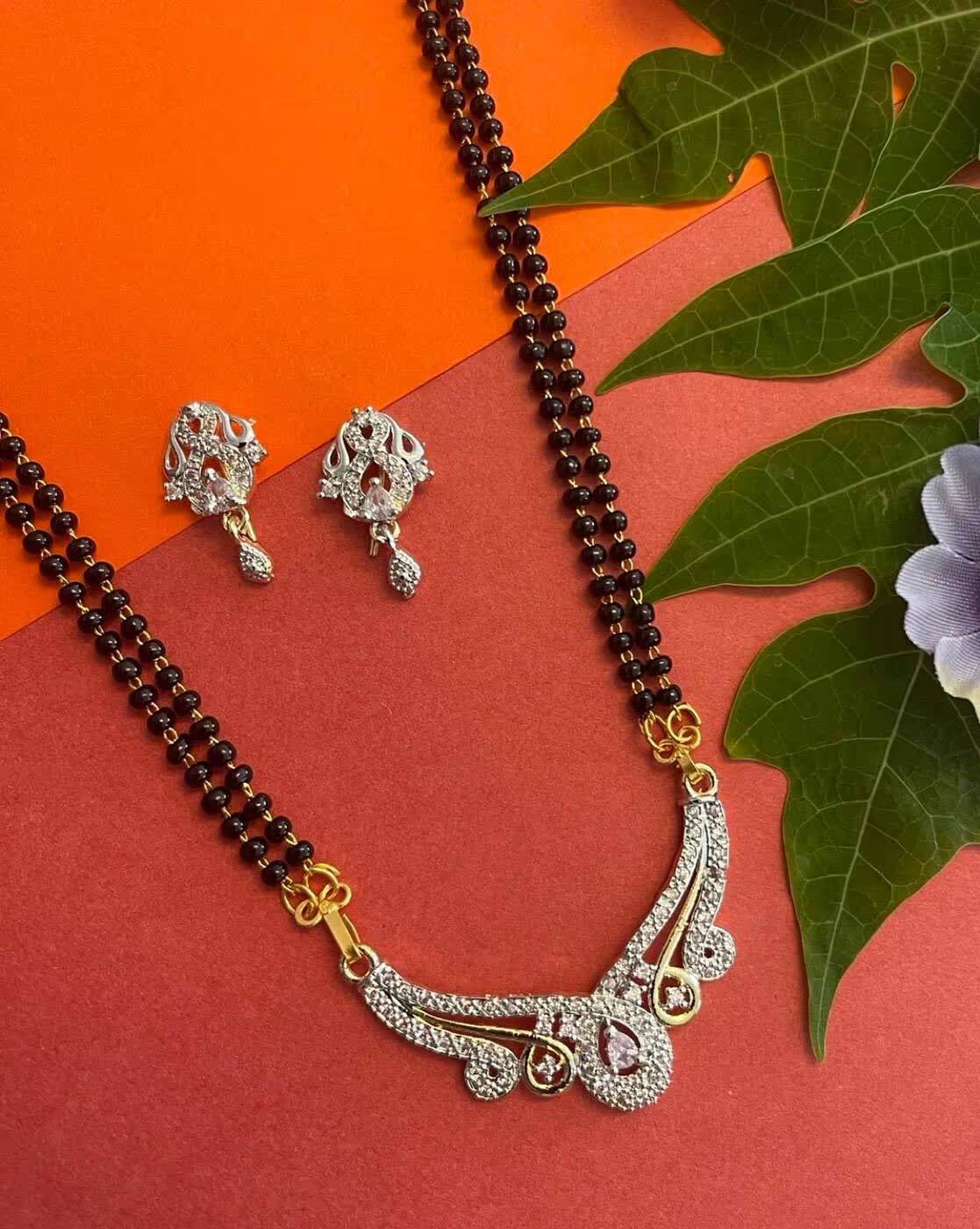 Women Stone-Studded Mangalsutra & Earrings Set