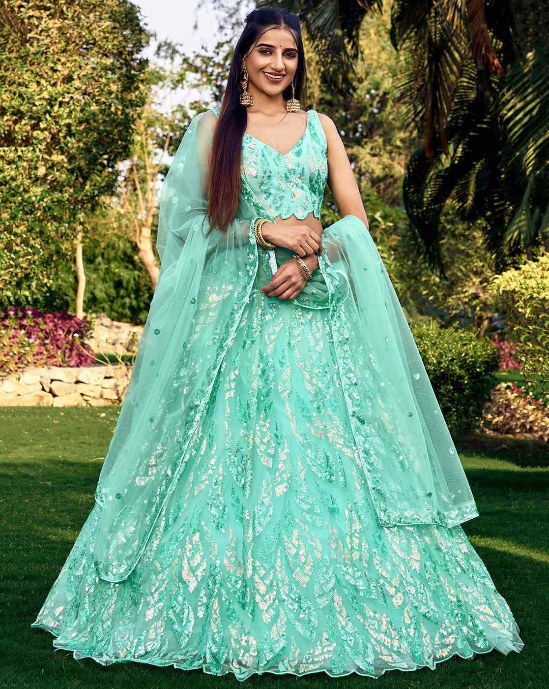 Women Embellished Flared Lehenga Choli Set with Dupatta