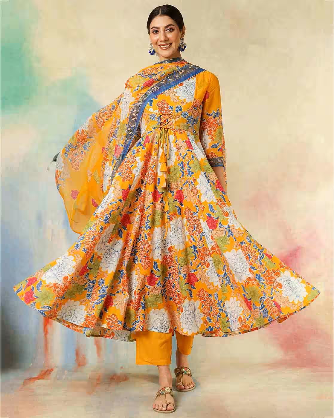 Aromie yellow floral three piece kurtha with dupatta and pants model twirling alternative to maroon anarkali dress online