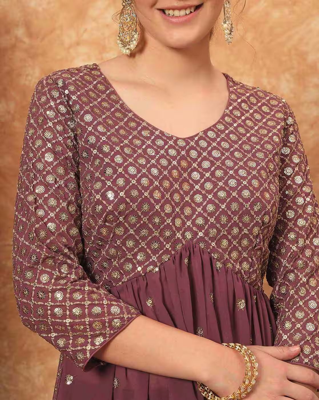 Aromie three piece kurtha in maroon with gold embroidered pattern and pleated waist Georgette Embroidered Festive Gown