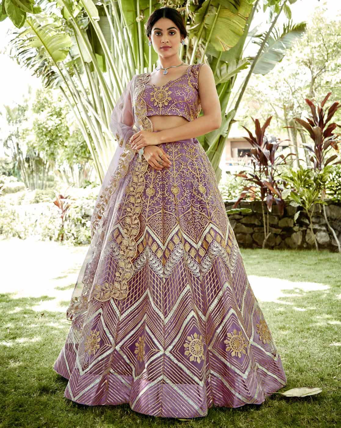 Women Embroidered Flared Lehenga Choli Set with Dupatta