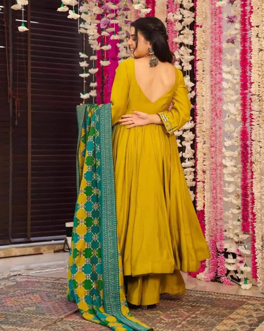 Aromie three piece mustard anarkali kurta set back view with green dupatta and earrings maroon embroidered kurta set