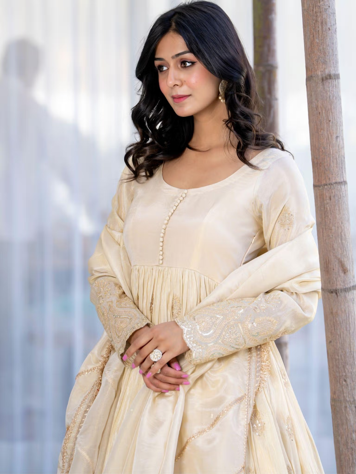 Aromie three piece Kurtha in ivory on model with embroidered dupatta, image not of bright red floral co-ord set