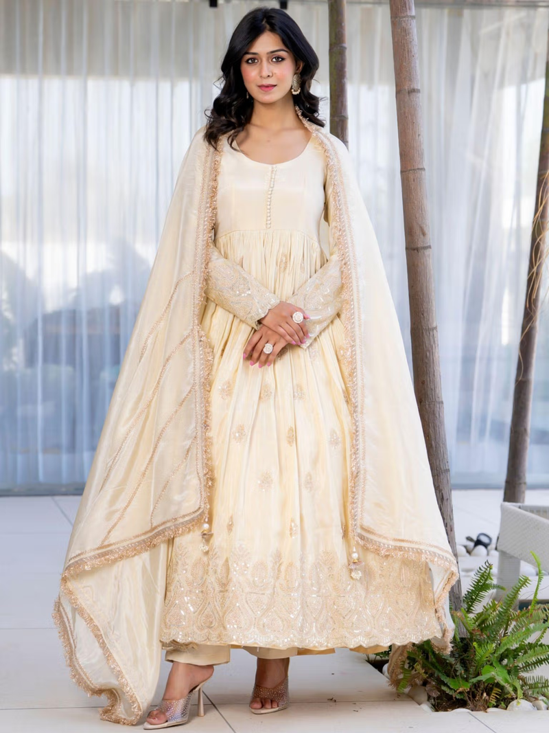 Aromie three piece Kurtha set in ivory with embroidered dupatta and gown on model bright red floral co-ord set