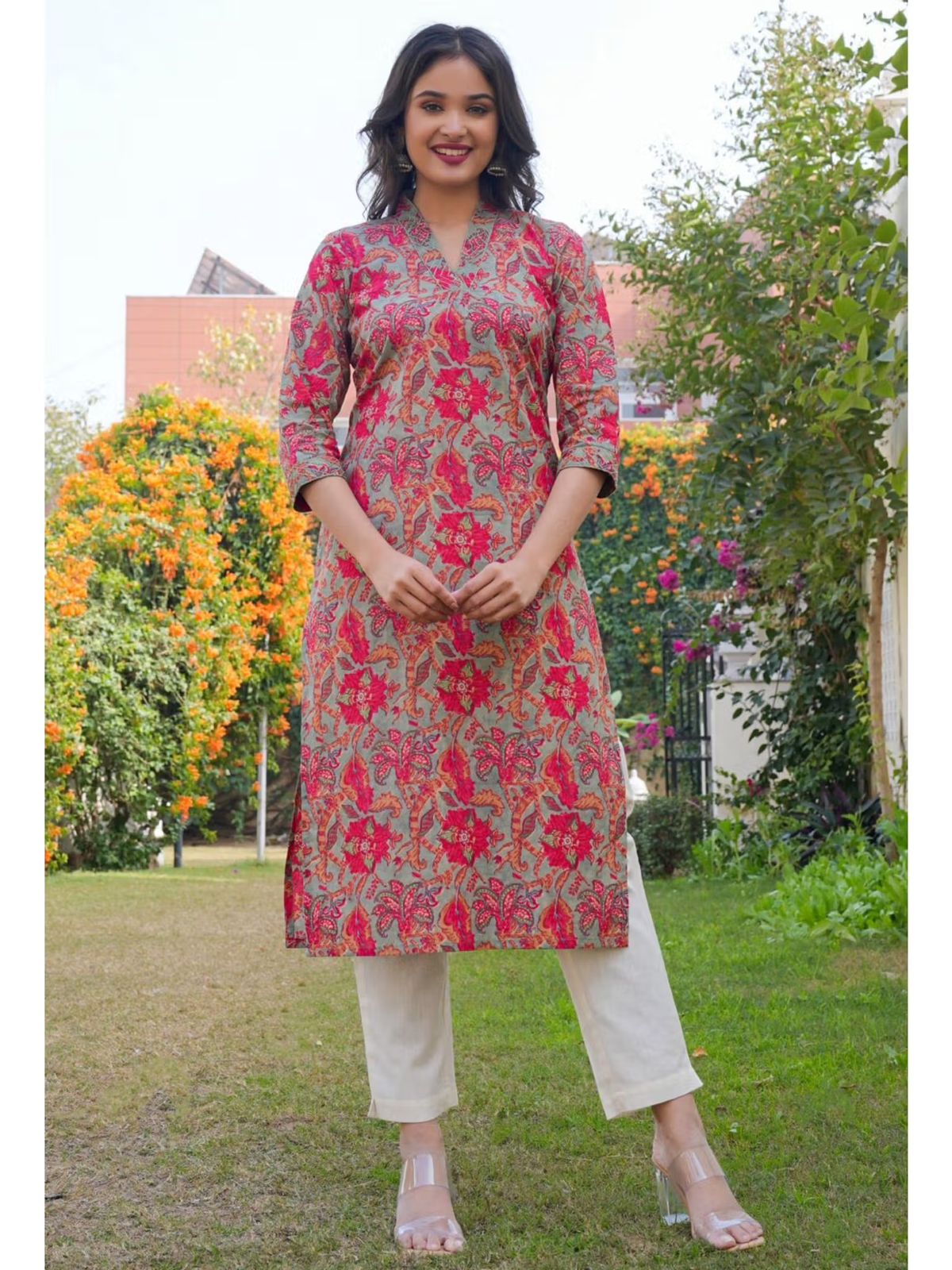 Aromie single piece kurta in coral paisley print with three quarter sleeves and beige pants Embroidered jumpsuit for women.