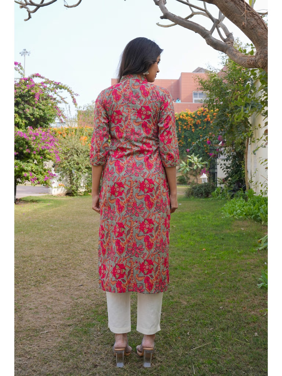 Aromie single piece kurta back view pink floral print with three quarter sleeves and white pants Embroidered jumpsuit for women