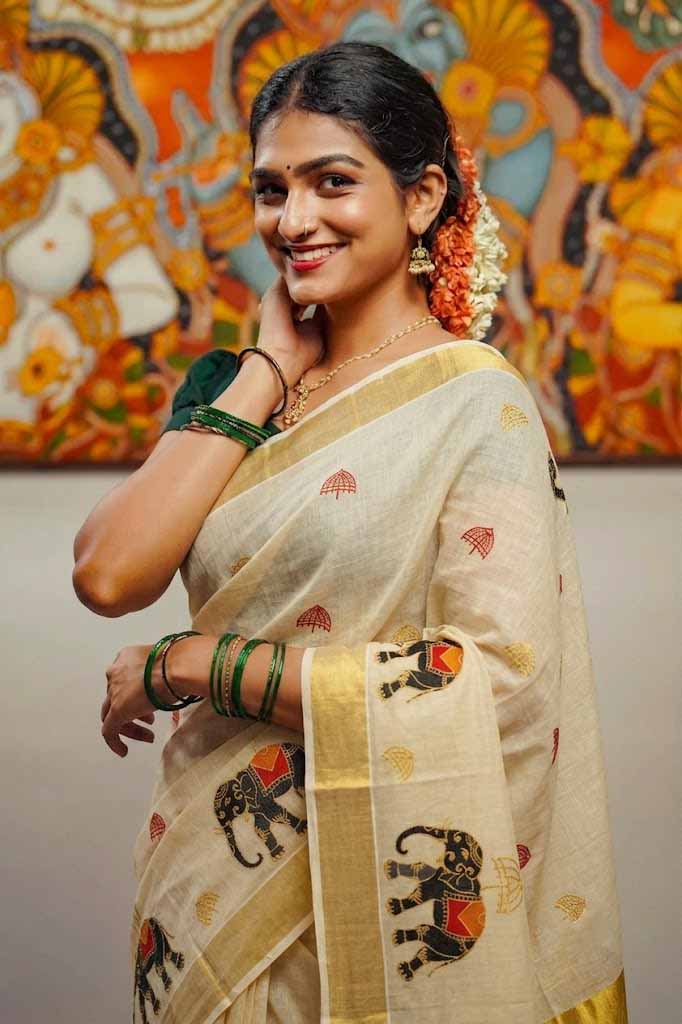Elephant Motif Tissue Kasavu Onam Saree with Golden Border