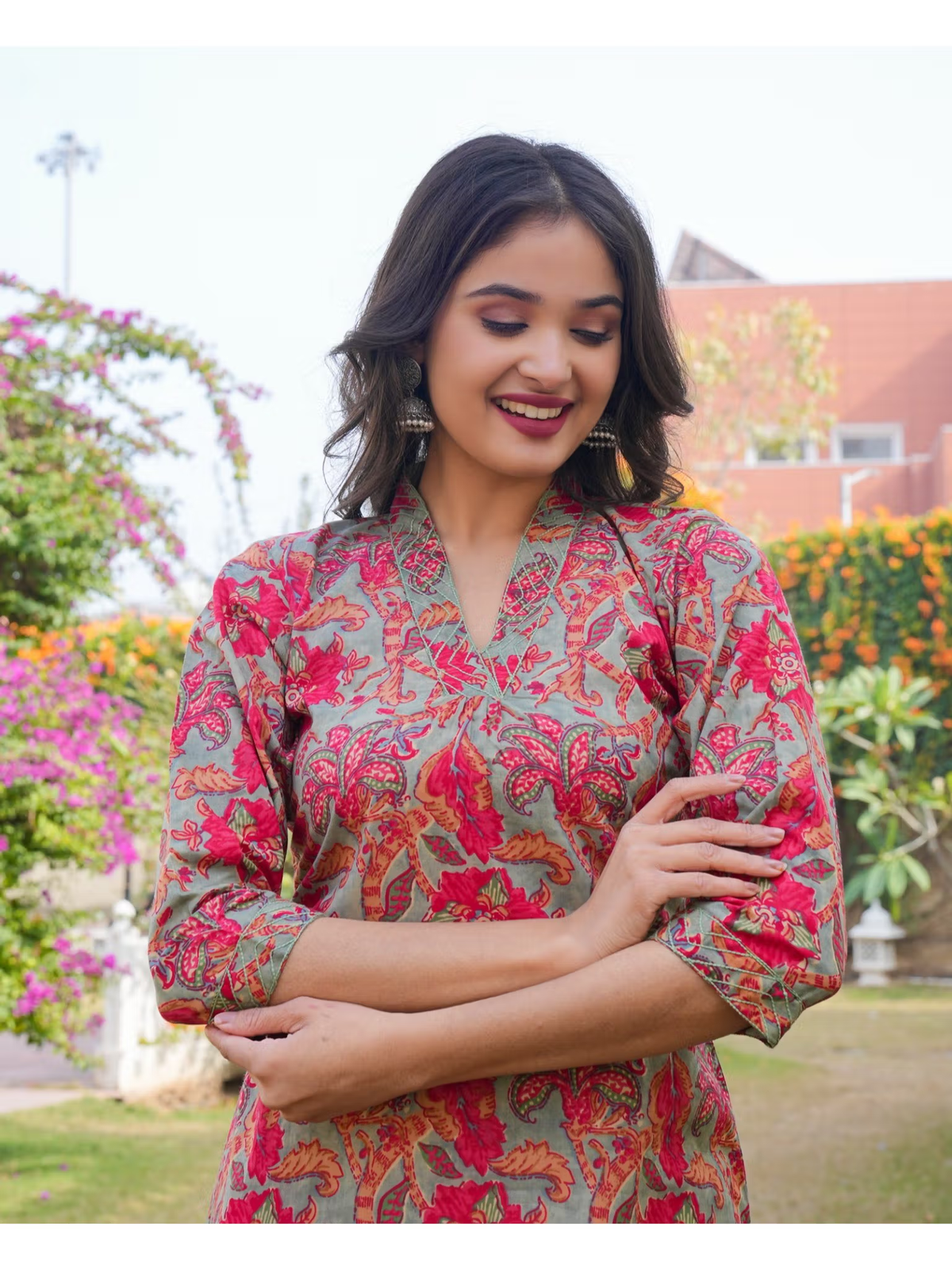 Embroidered jumpsuit for women. aromie pink paisley single piece kurta with three quarter sleeves and v neck