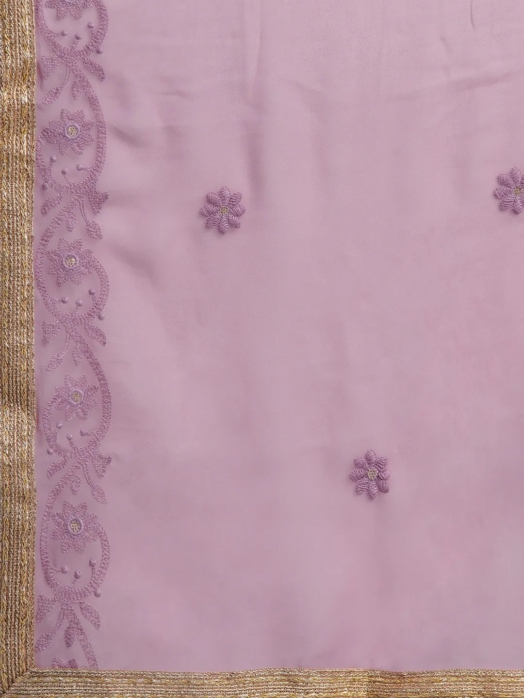 Front view of a lavender lehenga choli set USA with intricate floral embroidery and shimmering gold border