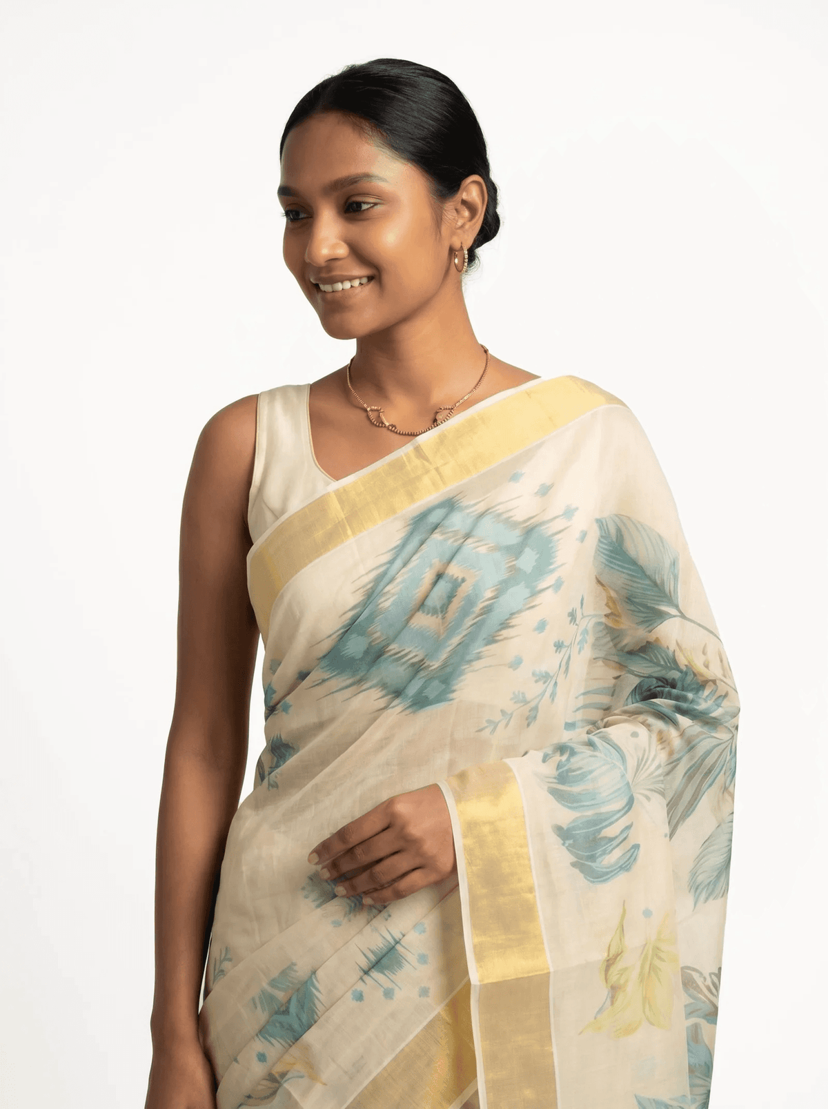 Teal Ikat Diamond Medallion & Tropical Leaf Digital Print, Gold Zari Border & Blue Tassel Pallu