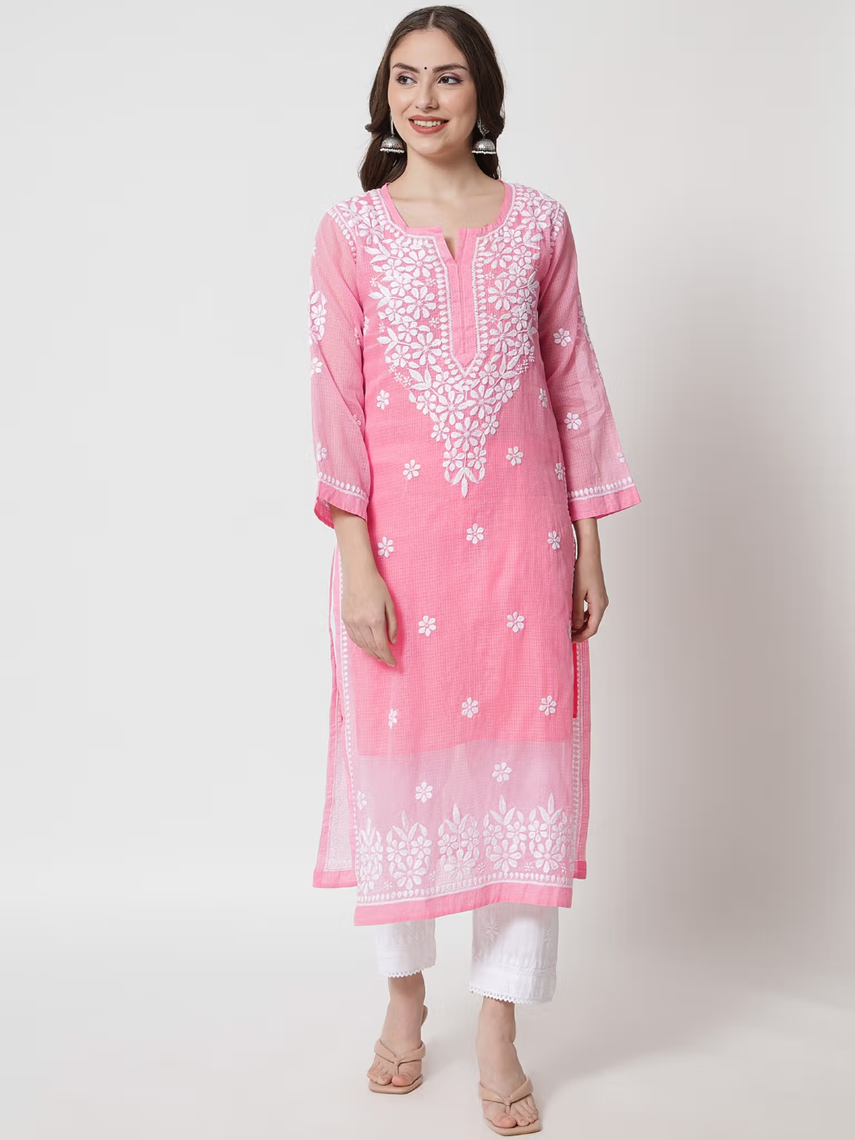 Aromie pink embroidered kurta with white motifs on model wearing white pants three quarter sleeves printed viscose jumpsuit