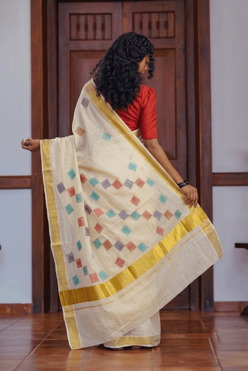 Cotton Cream Saree with Multicolor Geometric Motifs and Golden Border Set Saree
