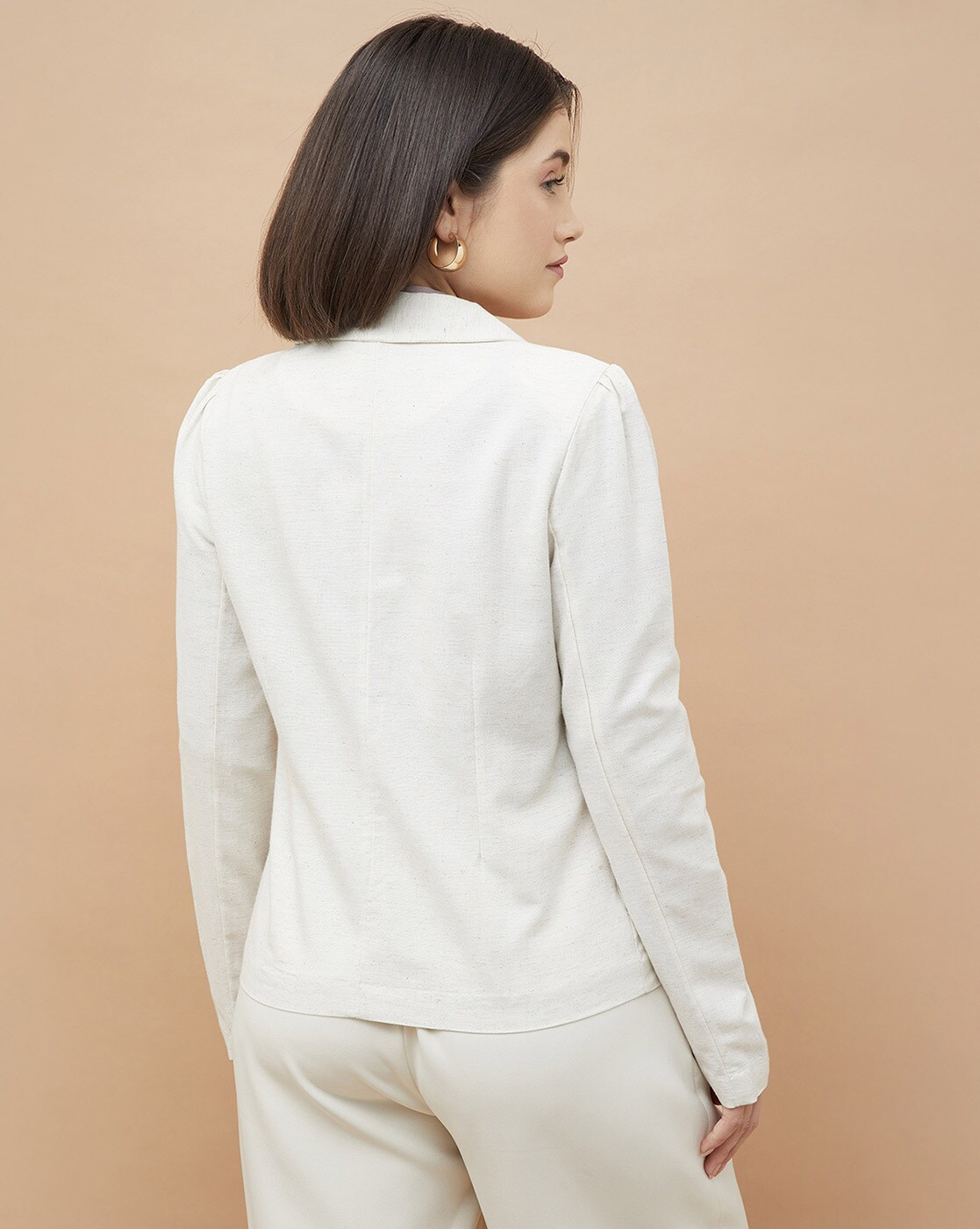 Front view of embroidered button closure jacket for women – elegant and tailored