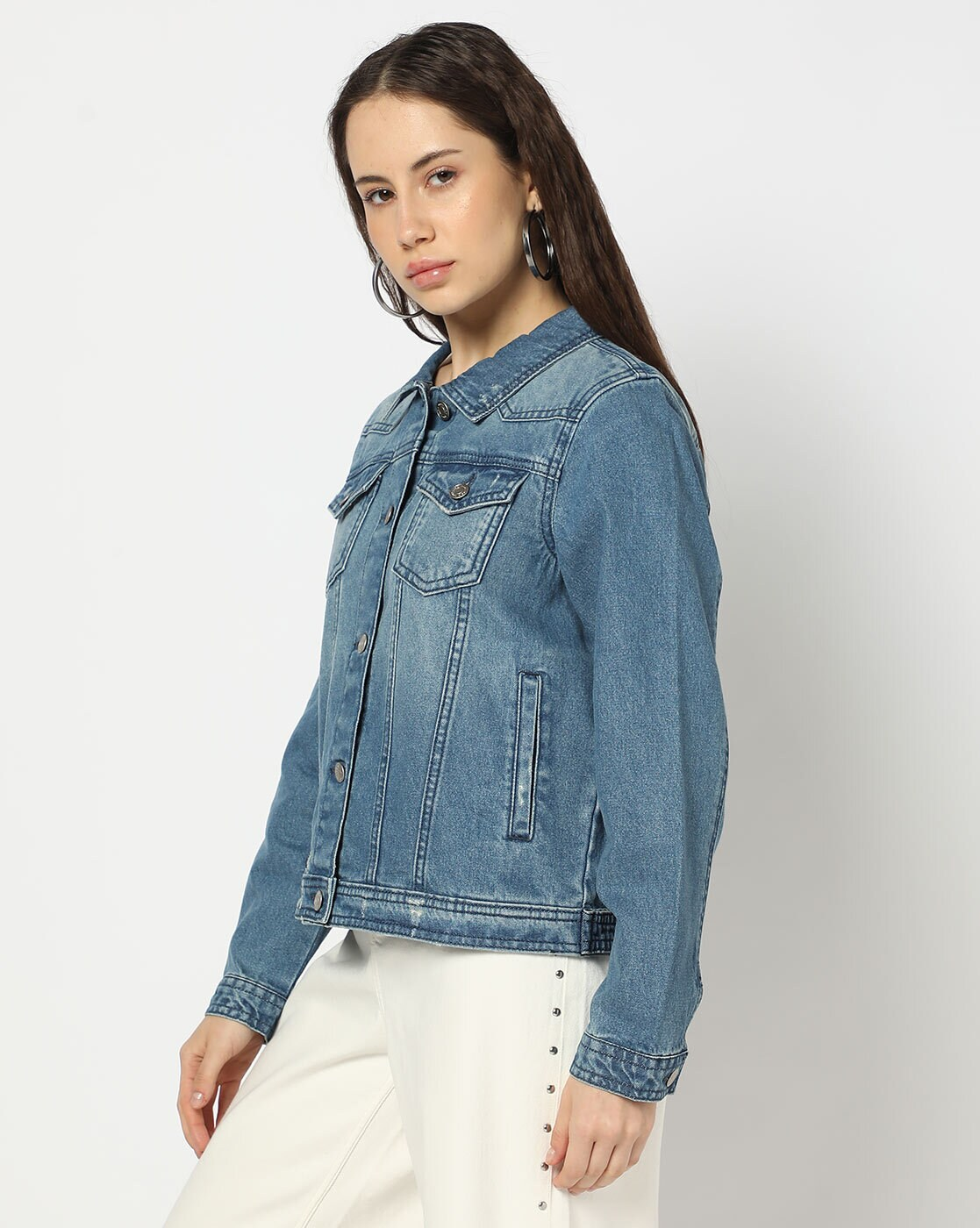 Front view of lightly washed denim jacket for women – relaxed fit and beige cotton