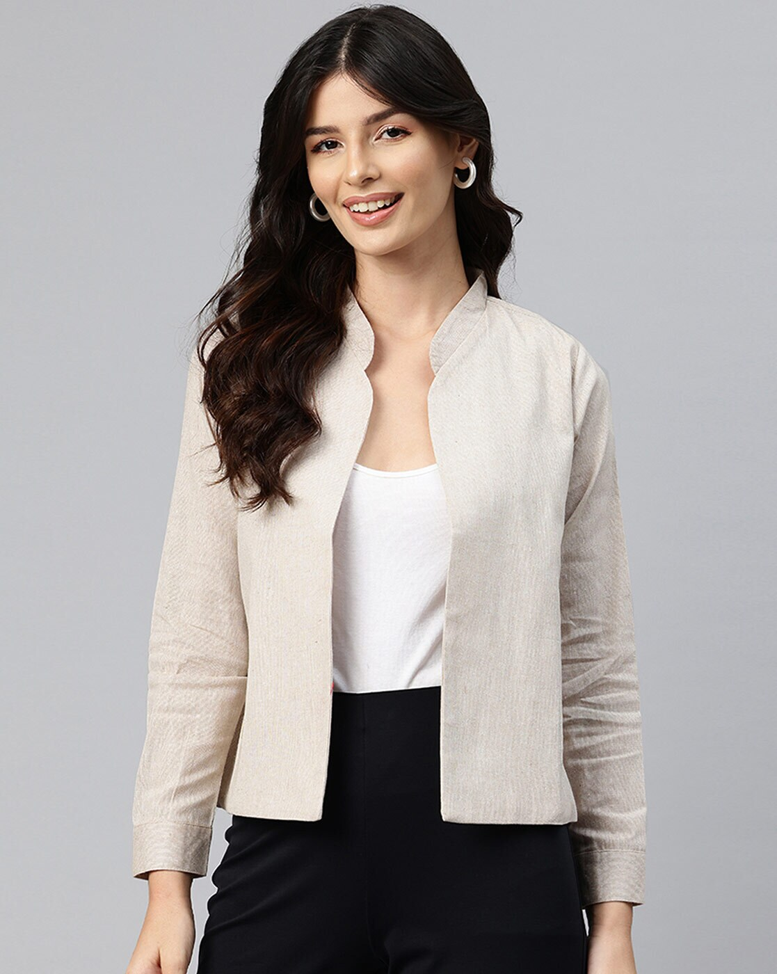 Front view of beige cotton open front jacket for women – lightweight and casual
