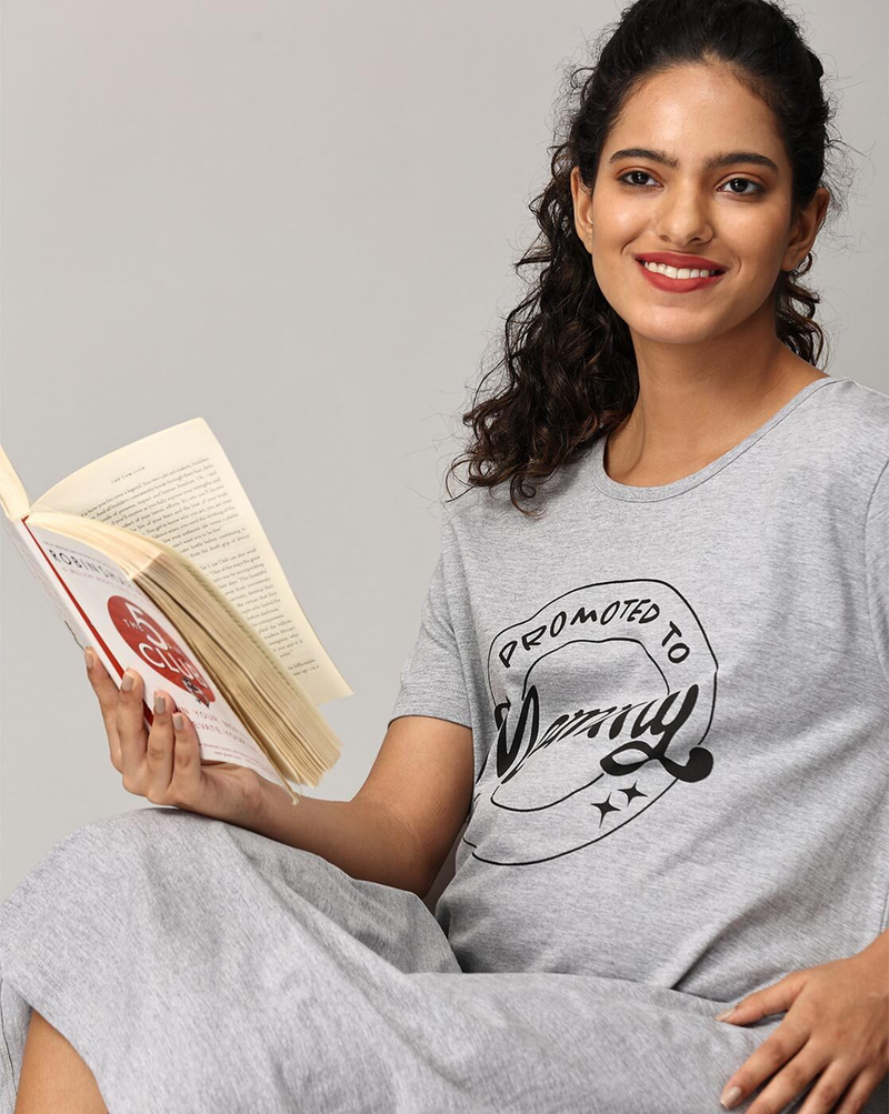 "Women’s cotton A-line maternity dress with typographic print and round neck – breathable pregnancy wear"