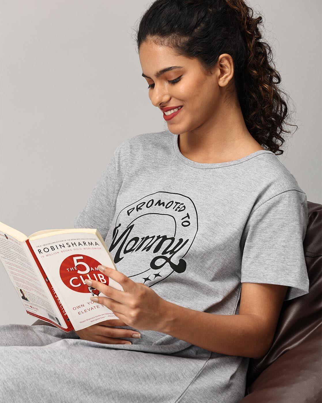 "Women’s cotton A-line maternity dress with typographic print and round neck – breathable pregnancy wear"