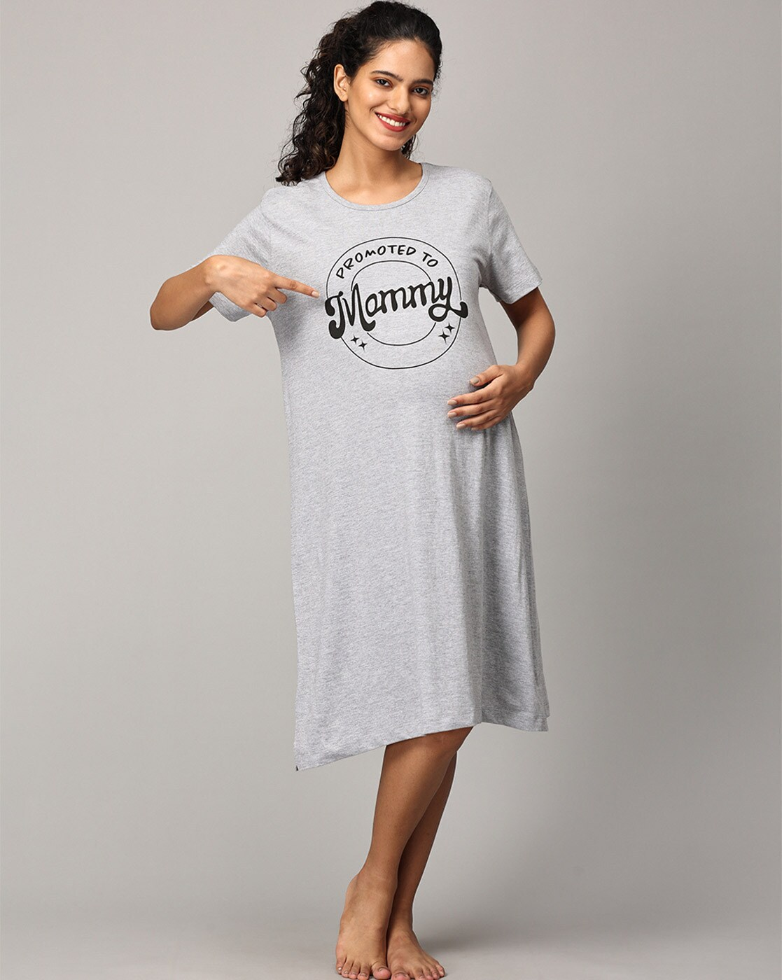 "Women’s cotton A-line maternity dress with typographic print and round neck – breathable pregnancy wear"