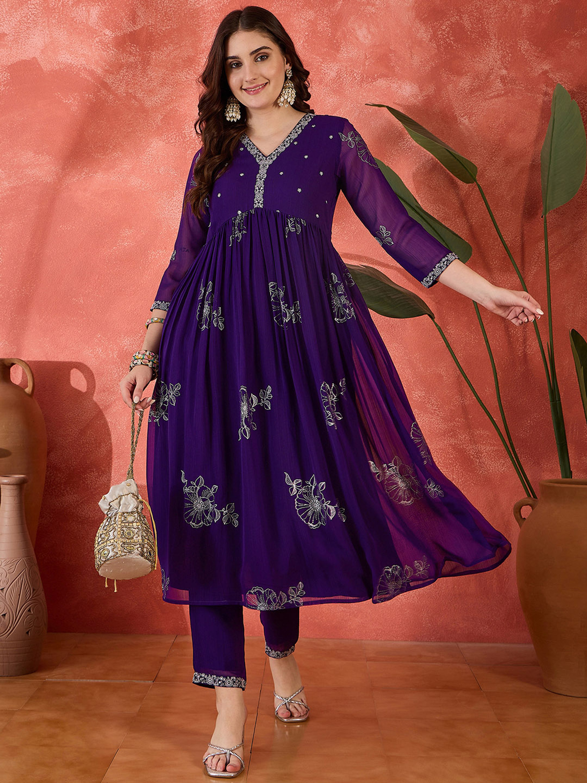 Floral Anarkali Kurta Set in purple with intricate embroidery and flowy design for elegant occasions