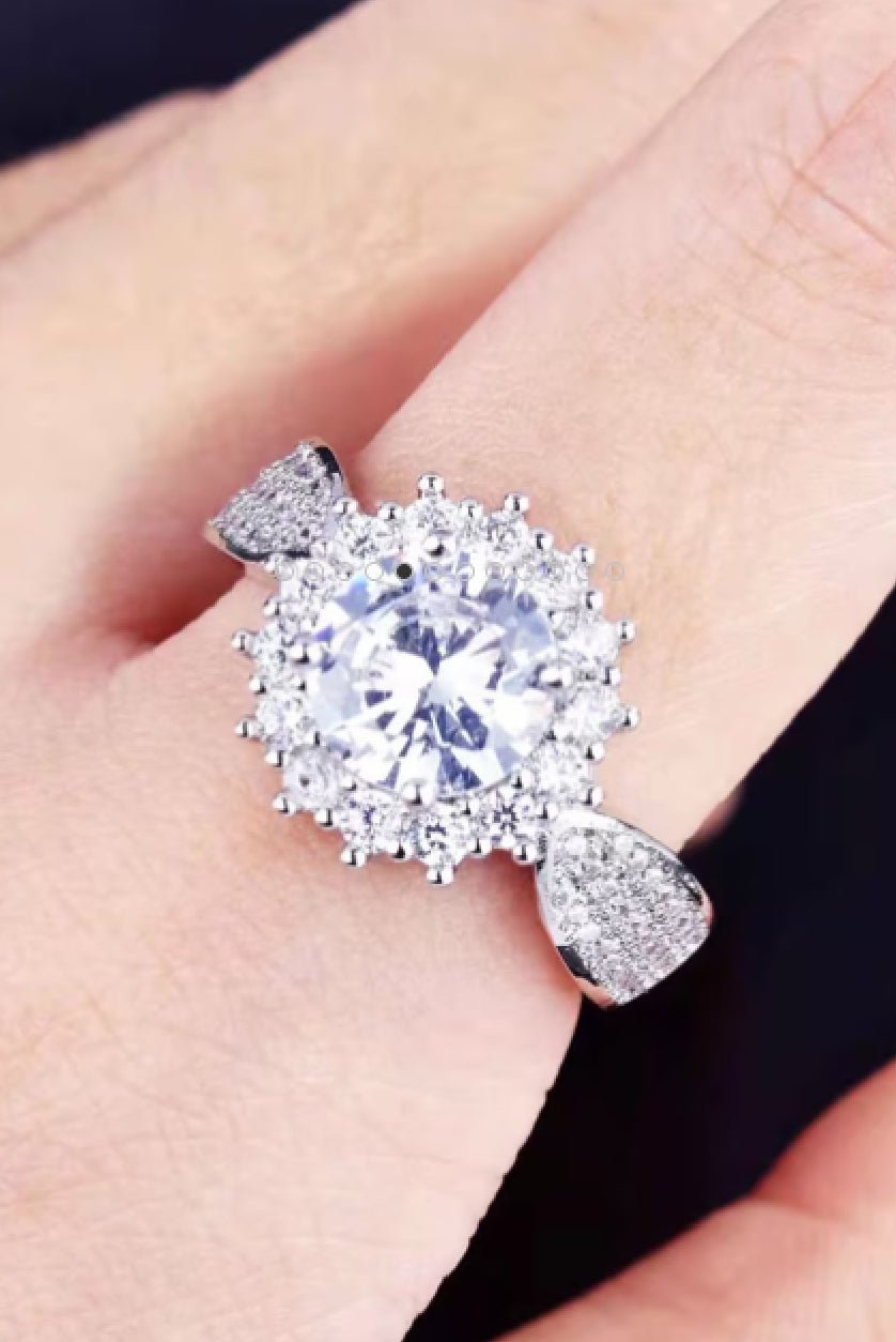 Elegant adjustable ethnic brass ring with sparkling gem centerpiece, perfect for unique jewelry lovers