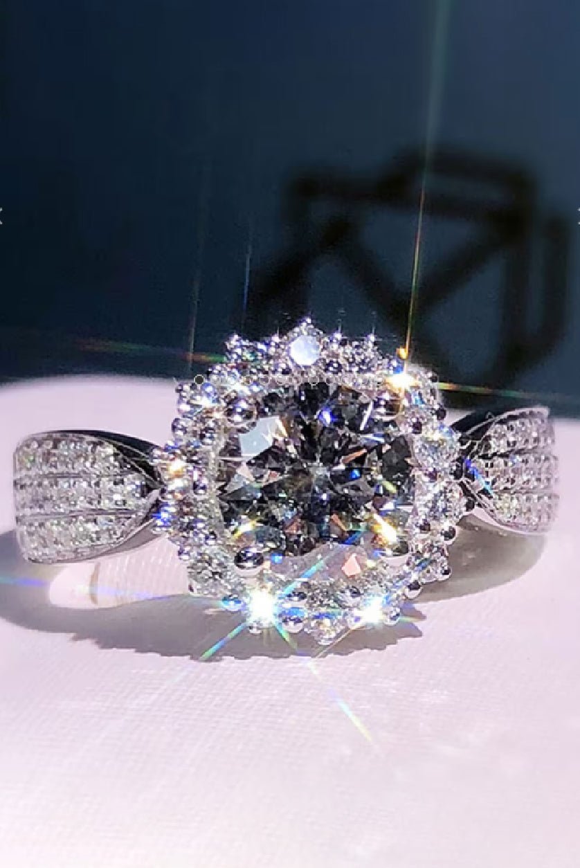 Elegant adjustable ethnic brass ring with a sparkling centerpiece and intricate design details