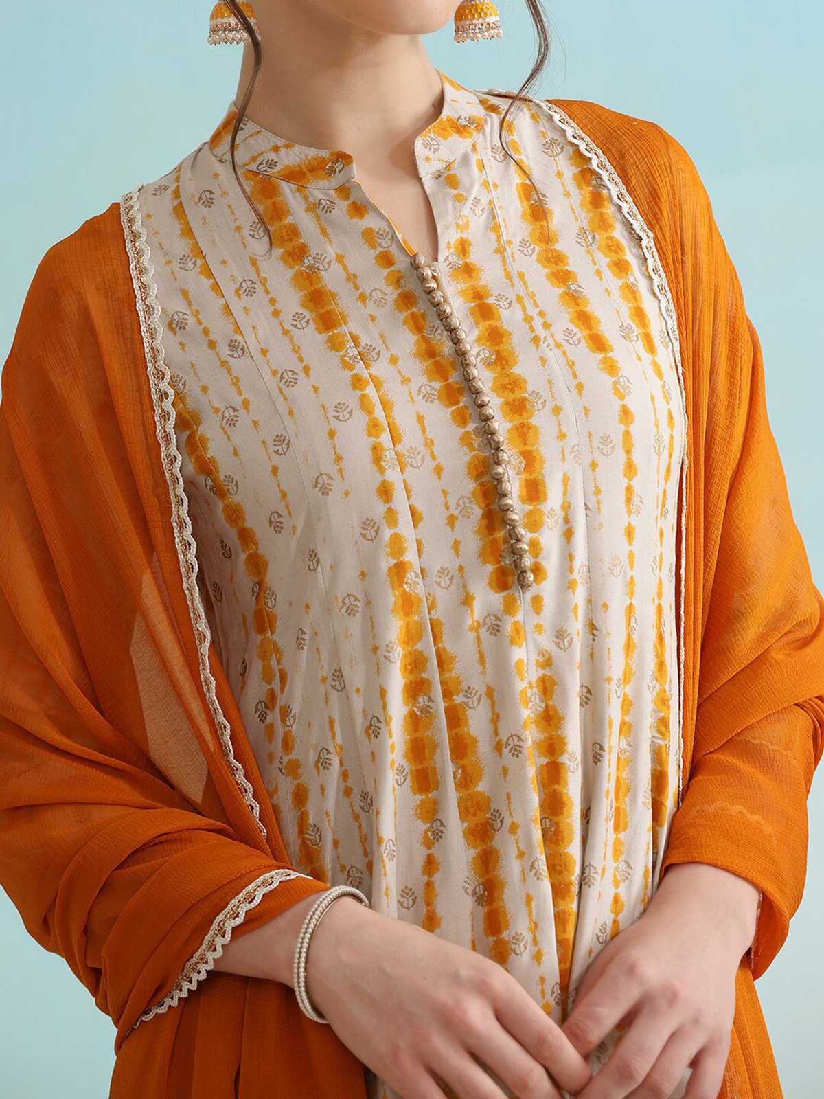 Aromie three piece Kurtha in orange and white, perfect for affordable ethnic wear Canada