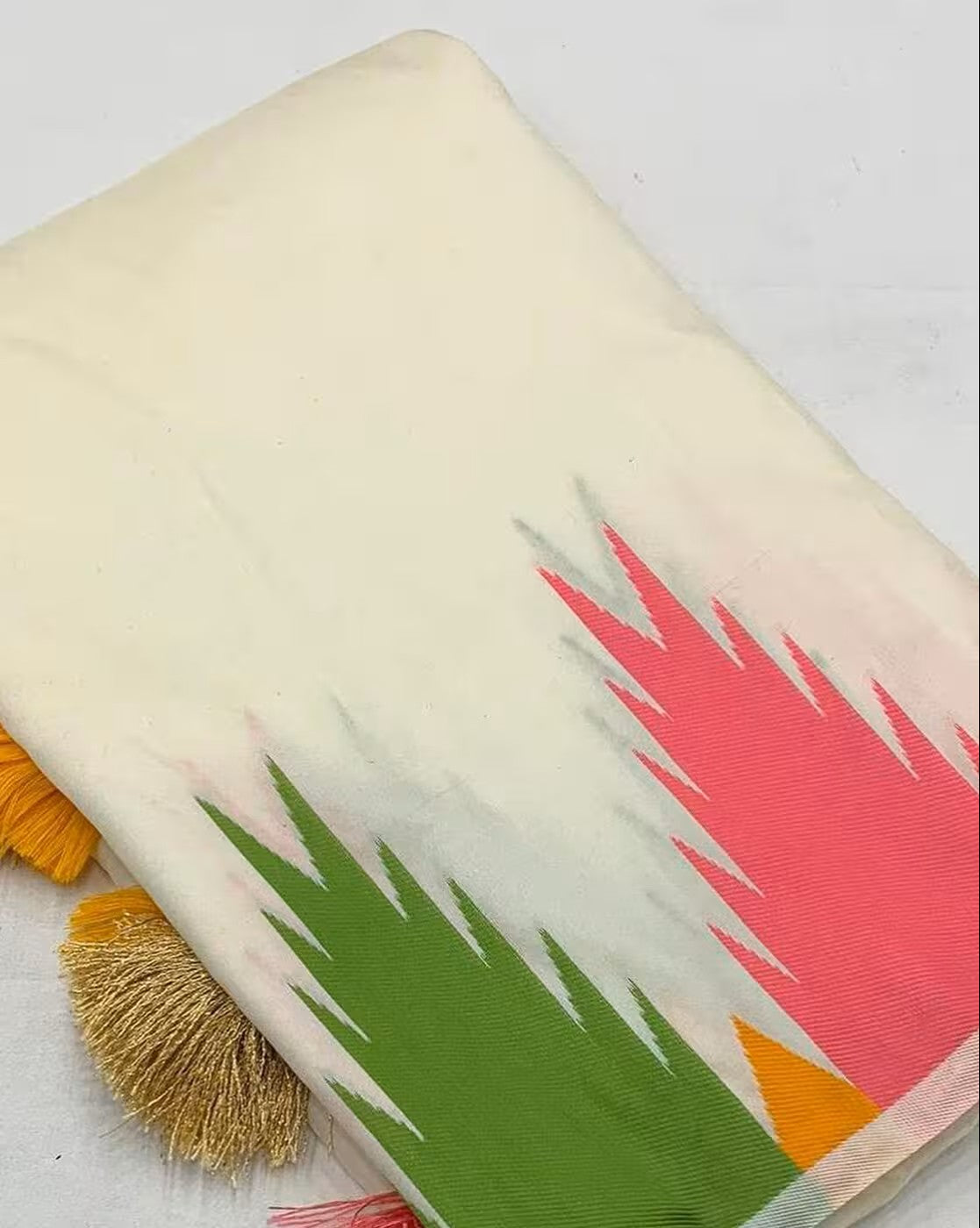 Aromie affordable silk saree Canada with cream base and colorful pink green geometric patterns