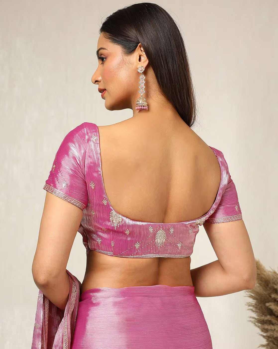 Affordable silk saree in pink with intricate embroidery, perfect for weddings and festive occasions