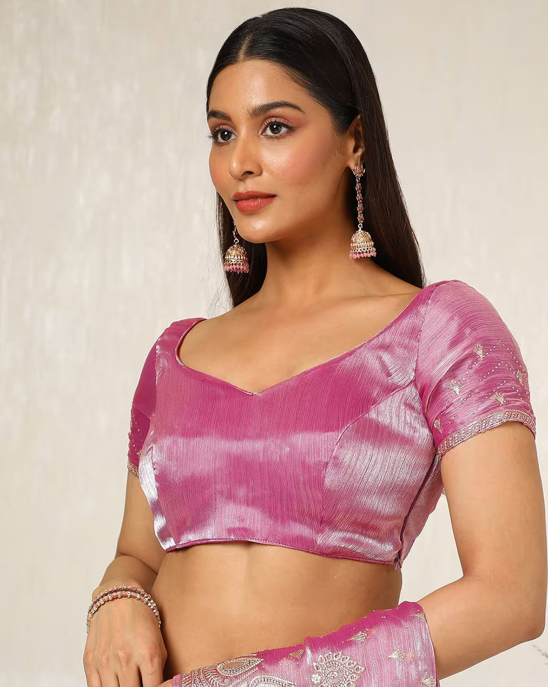 Front view of a pink silk saree by Aromie, perfect for weddings, highlighting affordable silk saree Canada