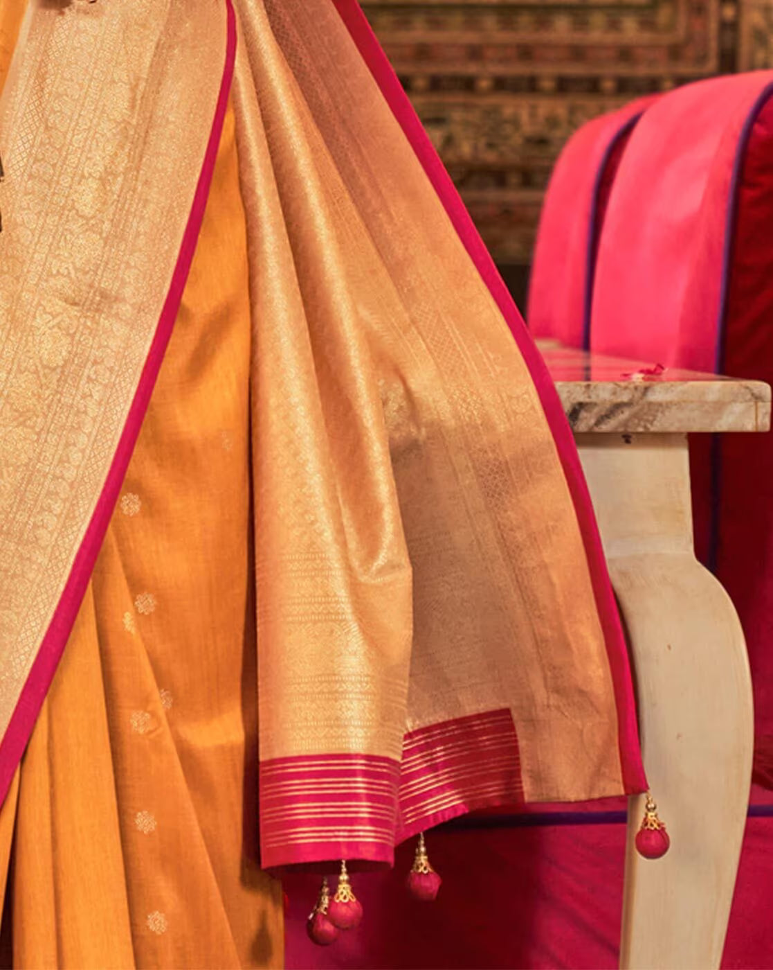 Elegant affordable woven silk saree with intricate borders and decorative tassels