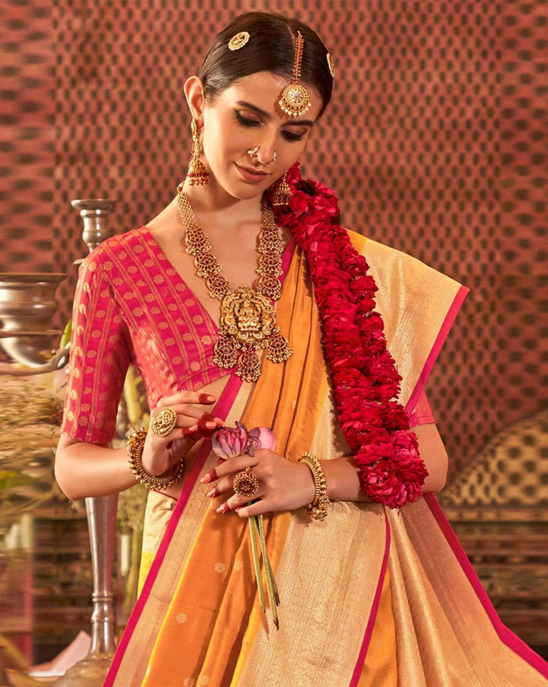 Elegant model in an affordable woven silk saree with intricate designs and vibrant colors