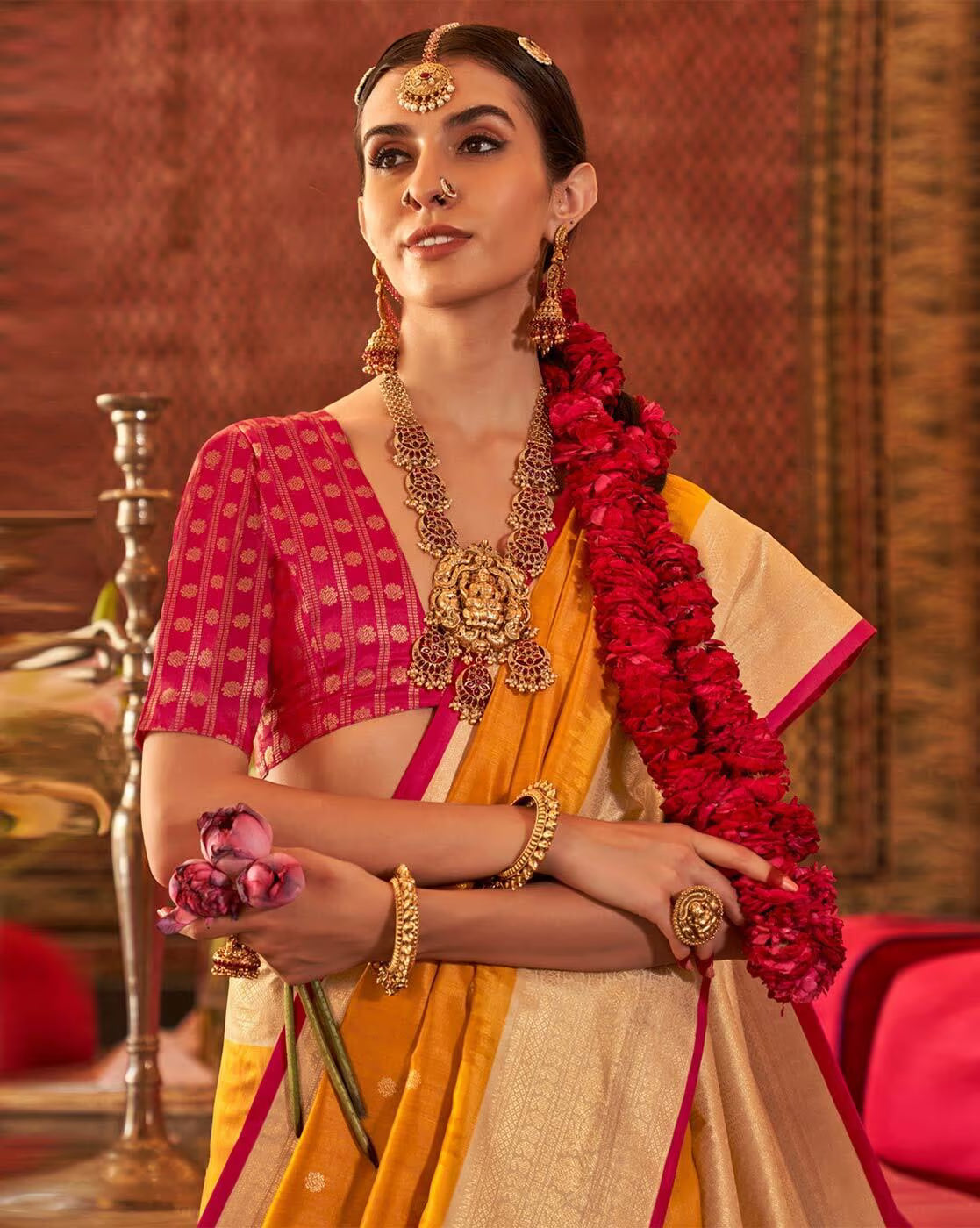 Elegant woman in vibrant attire featuring an affordable woven silk saree with intricate details