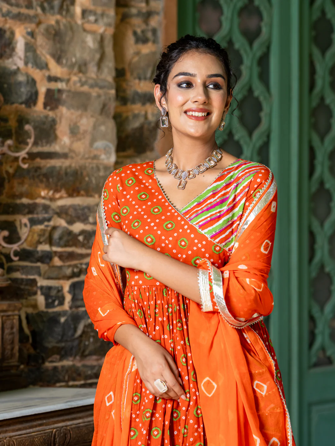 Three piece orange anarkali dress online Canada in lightweight fabric, perfect for festive occasions