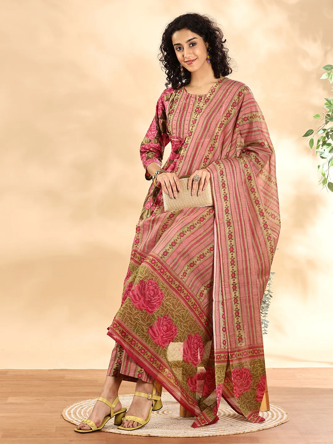 Aromie Anarkali Kurta Set Canada in pink floral design, perfect for festive occasions, featuring a front view and lightweight fabric.